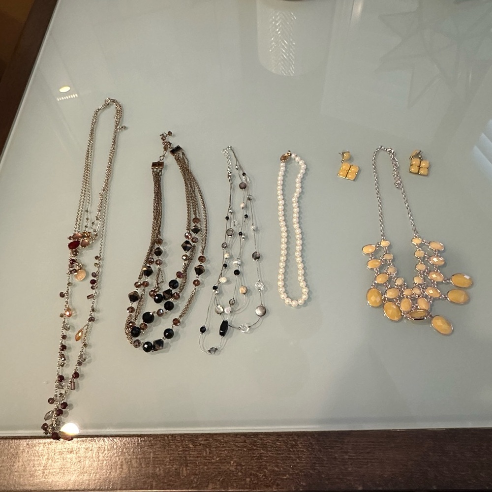 Five necklaces and one pair of earrings